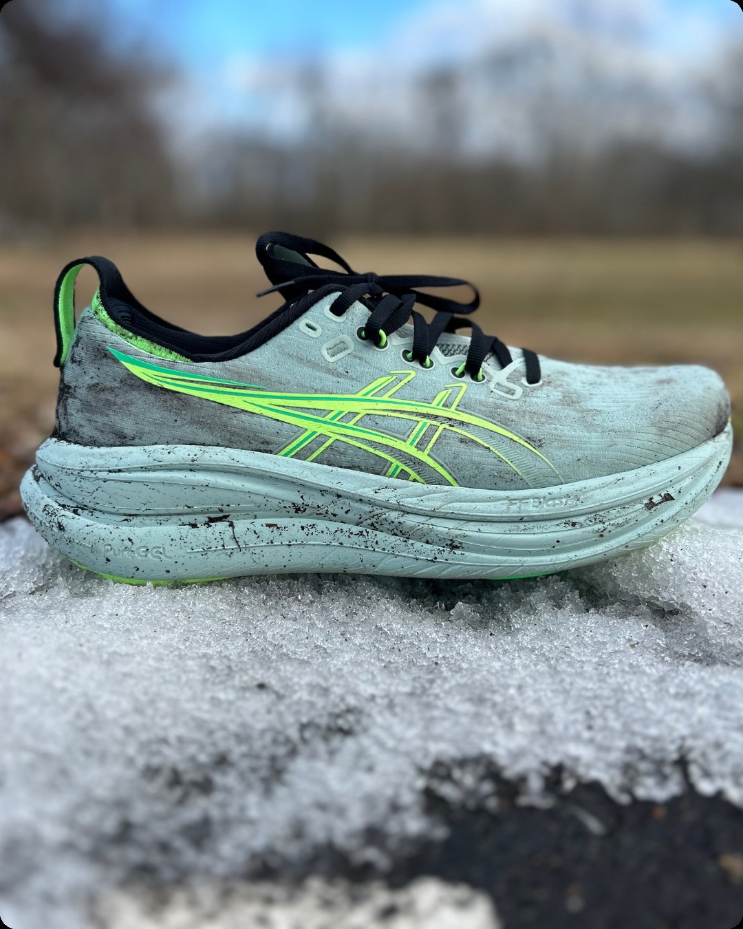 ASICS Gel Nimbus 28 in snow close-up