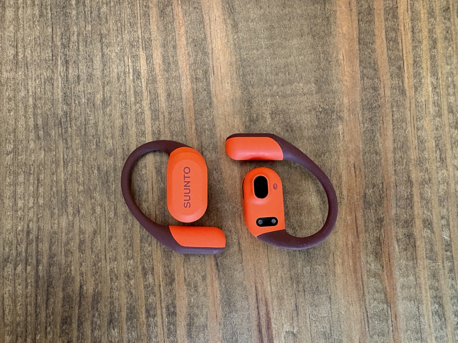 Close-up of the Suunto Spark open-ear wireless earbuds